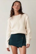 White knitted pullover